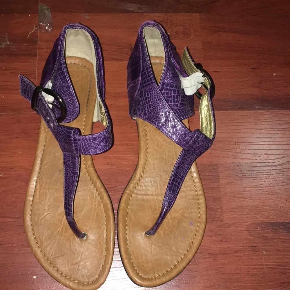 Purple thing sandals .